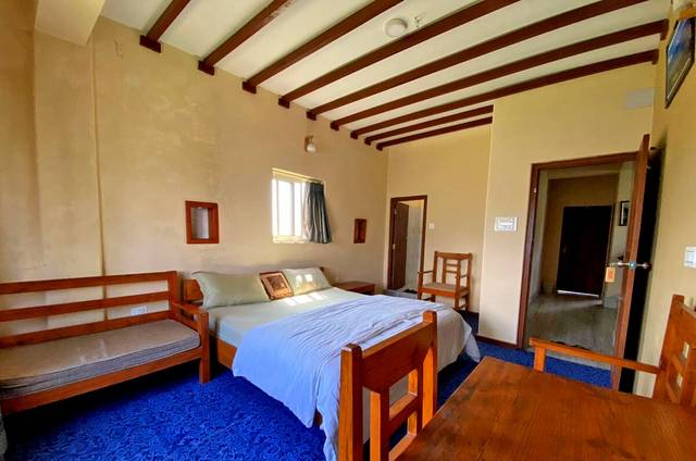 Hotel in Pokhara kings size bed. mountain view