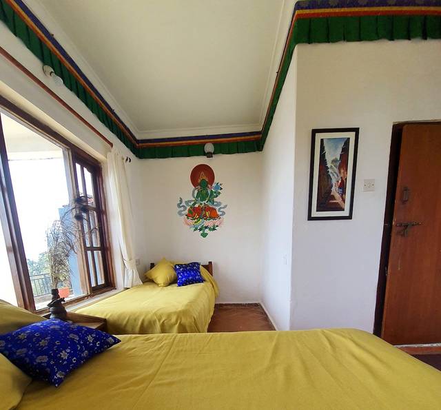 Peace Dragon Lodge. Twin room. Double aspect.