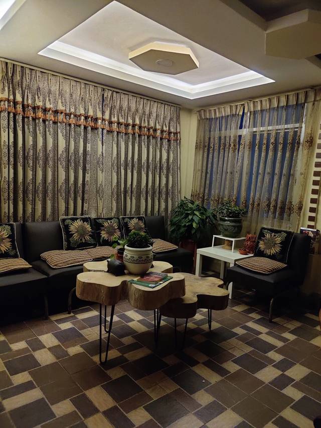 Sun-drenched room in a quiet Gothatar home.