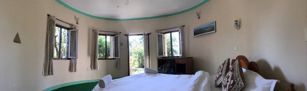 Round House Room 2 Deluxe Double Garden View — photo