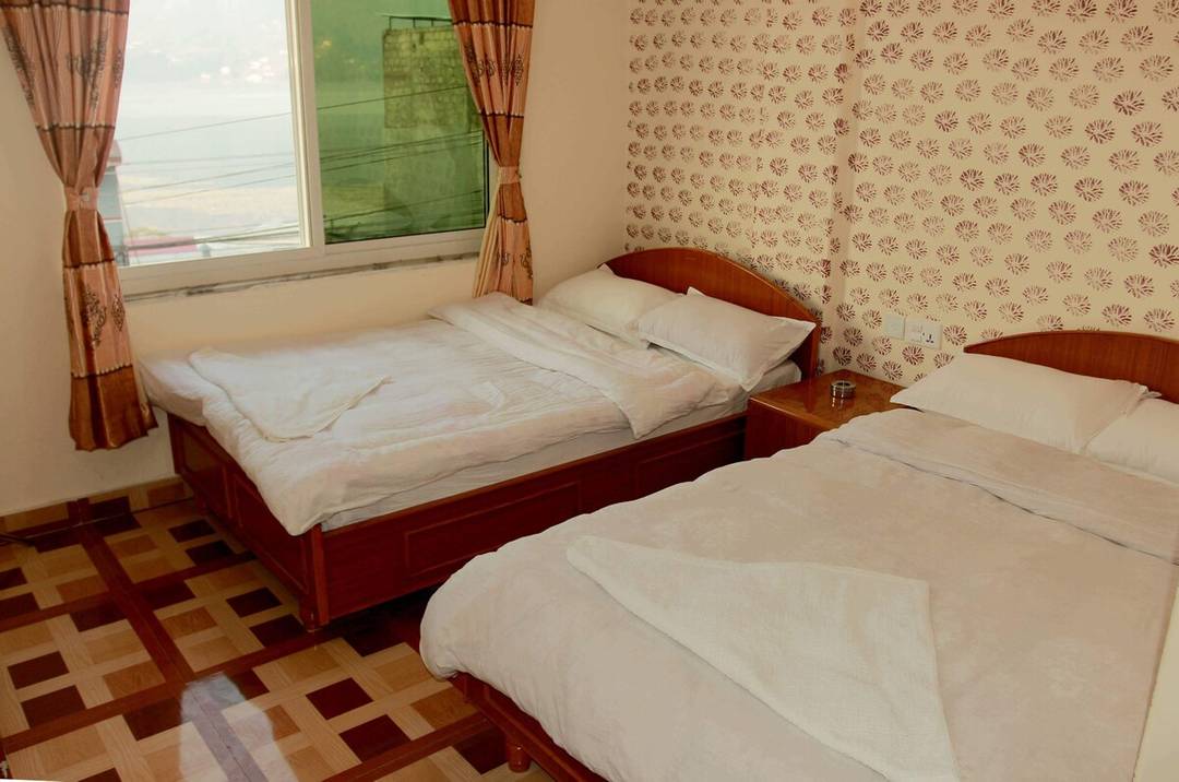 Deluxe Quadruple Room ; Near Fewa Lake — photo