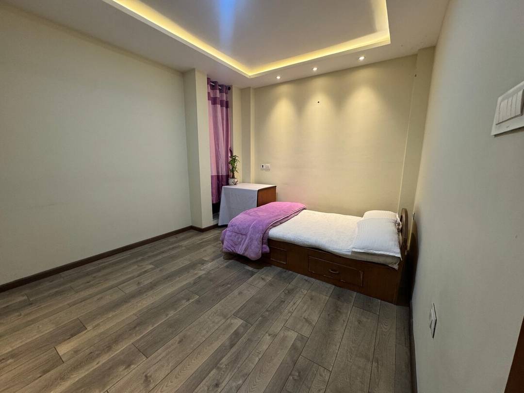 Peaceful room with private bathroom and balcony.