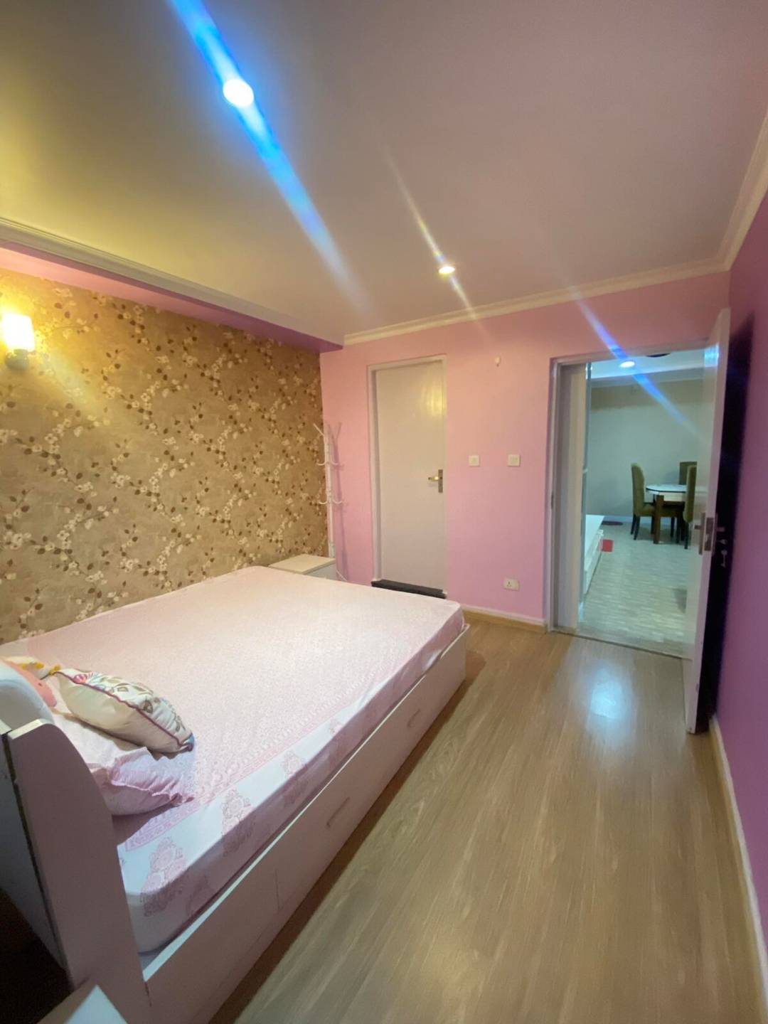 A modest room with city view — photo